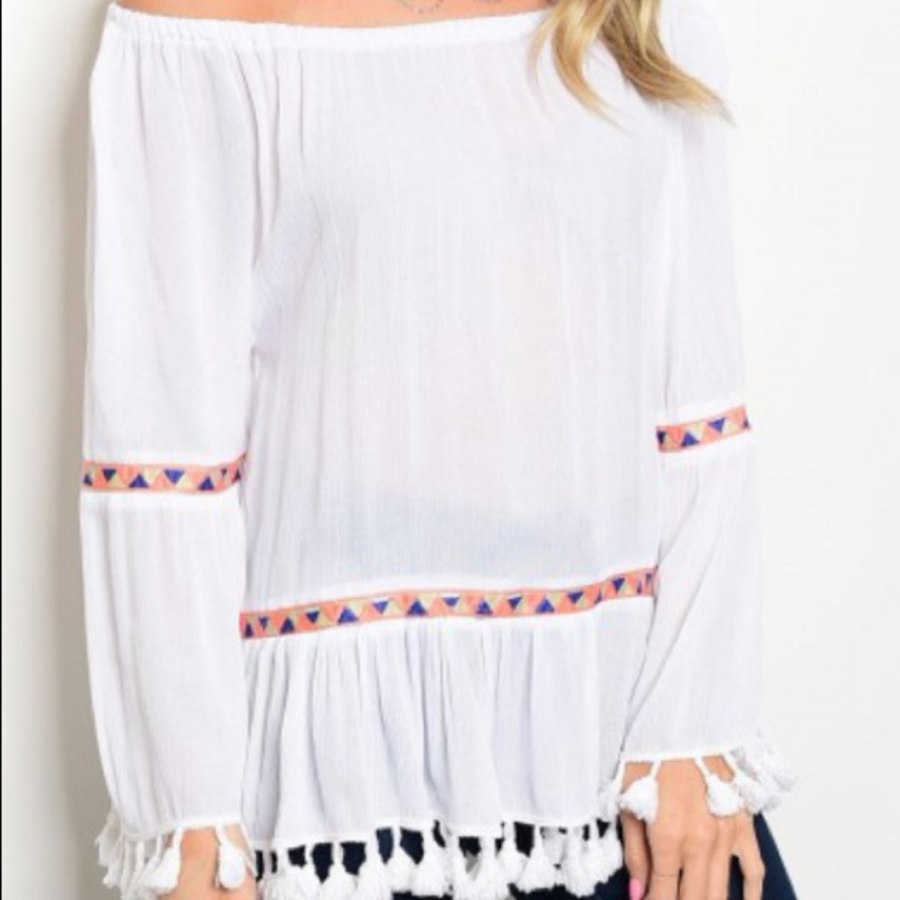 Off the shoulder white shirt.